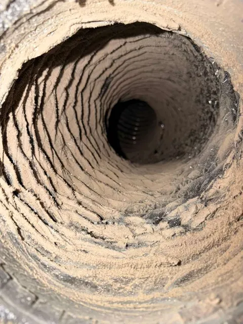 Dust buildup inside an air duct in Colleyville TX